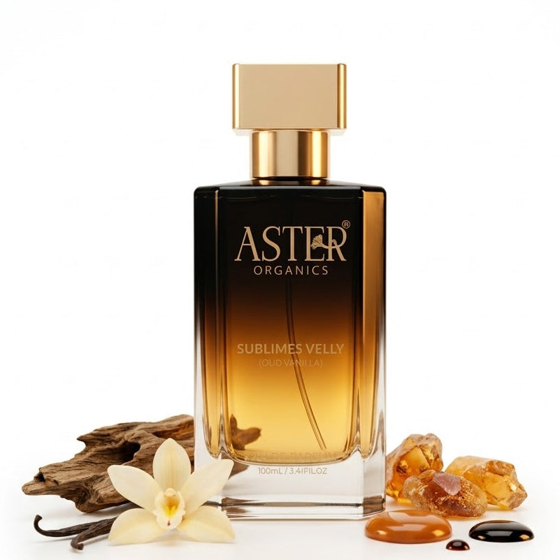 Aster Organics perfume bottle with vanilla flower and amber elements on a white background
